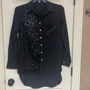 Black blouse ( long) size medium. Sequins on one side and on the pocket.